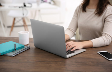 Work concept. Woman using laptop