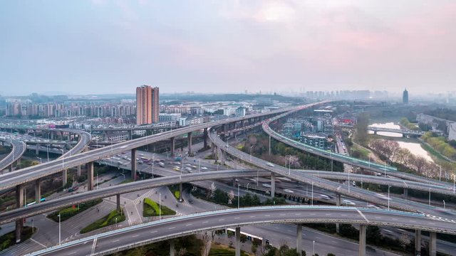 time lapse of overpass at dusk , city interchange of expressway in nanjing