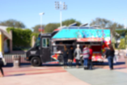 Blurred Background Of People Ordering At Food Truck