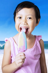 Little girl eating ice cream