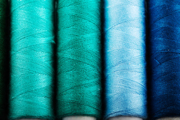 Background of colorful sewing threads