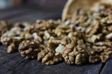 peeled walnut on a wooden background