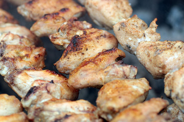 Chicken on the grill to cook