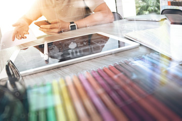 Website designer working digital tablet and computer laptop with