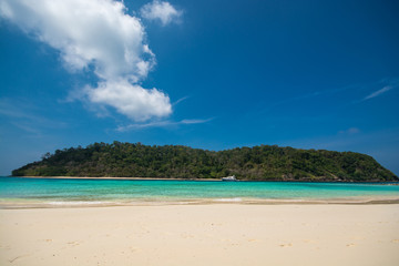 Fototapeta na wymiar Island and beach in blue sky background