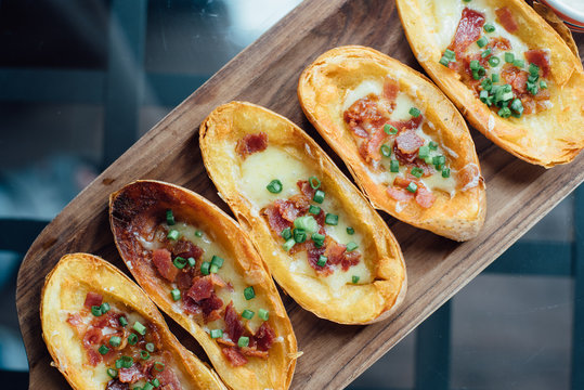Slice of potatoes grill with cheese