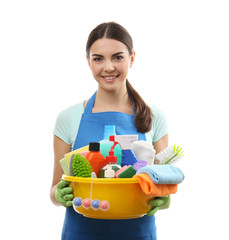 Young woman holding cleaning tools and products in tub, isolated on white