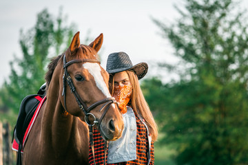 Obraz premium cowgirl and horse