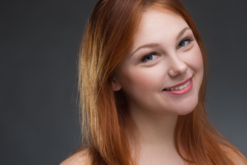 Fototapeta premium beautiful young red-haired woman