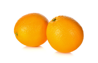 whole ripe orange on white background