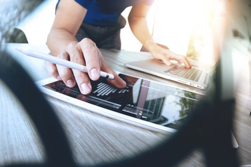 Website designer working digital tablet and computer laptop with