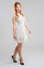 young woman in a white dress