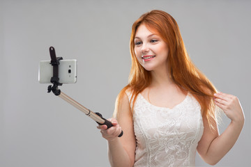 Girl  doing selfie with your phone