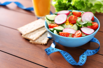 Vegetable salad on wooden table closeup
