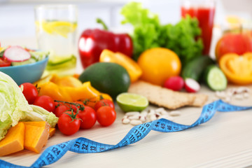 Fresh fruits and vegetables on wooden table closeup