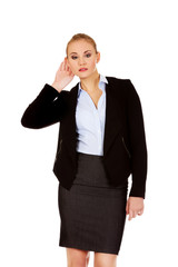 Young business woman overhears a conversation