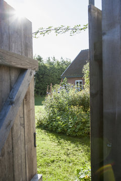 Open door with house in background