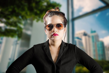 businesswoman with cityscape background