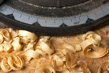 Carpenter working. Sawdust shot