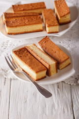 sliced Japanese Castella cake closeup on the table. Vertical
