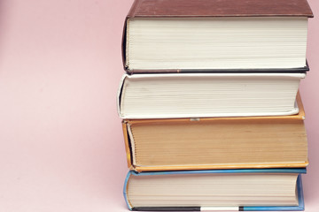 Vintage old books on light background