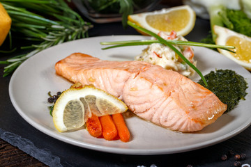 grilled Salmon with lemon, herbs and pesto