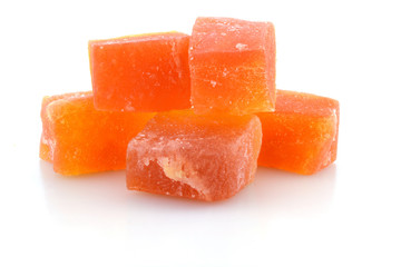 Dried papaya sticks over white background
