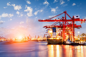 Fototapeta premium Industrial container freight Trade Port scene at sunset