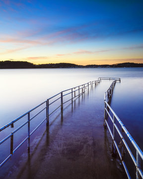 Lake and abandoned pier
