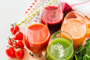 Selection of colorful vegetable juice in glasses