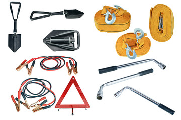 Elements of the essentials for a passenger car. Danger Safety Warning Triangle Sign, towing rope, fire extinguisher, Jumper cable, wheel wrench and shovel.