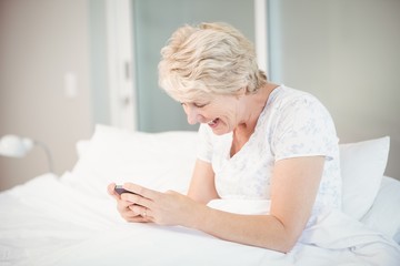 Senior woman using phone