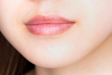 Fototapeta premium 唇のクローズアップ・若い女性