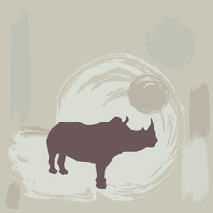 rhino silhouette on grunge background. vector