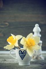 Background with  blue coffee cup and flowers