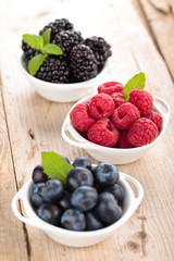 Fresh berries in bowls.