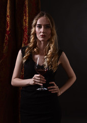 woman with glass of red wine