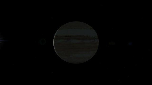 Giove e il suo satellite Io che proietta la sua ombra sul disco del pianeta