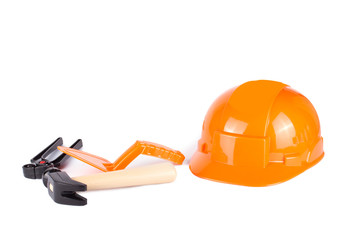 Toy construction helmet and tools over