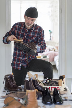 Man Polishing Shoes