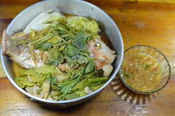 steam fish and vegetable dipping with soy bean sauce