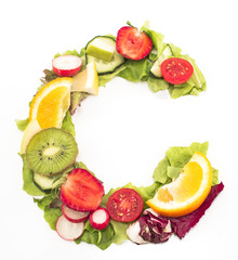 Letter C made of salad and fruits