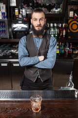 Barman serving cocktail.
