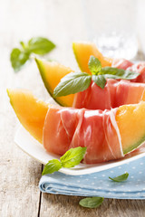 Melon with ham and basil