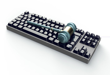 legal computer judge concept, cyber gavel on computer keyboard