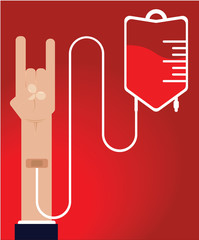 Blood donation, human arm showing the rock sign 