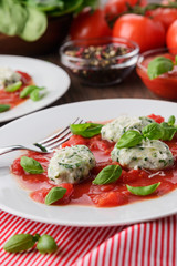 Homemade malfatti with tomato sauce