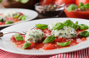 Homemade malfatti with tomato sauce