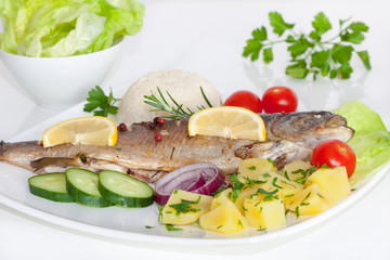 Baked trout with potato, cherry tomatoes and green salad