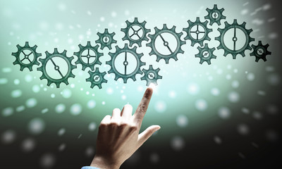 Cogwheel mechanism as teamwork concept